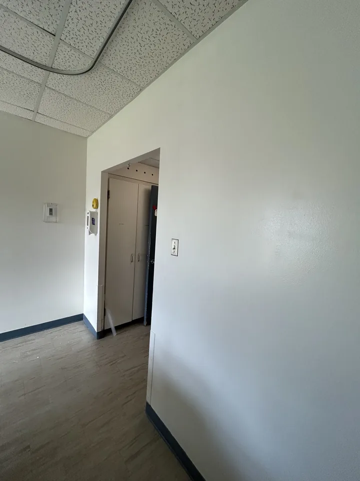 Finished white interior wall and doorway